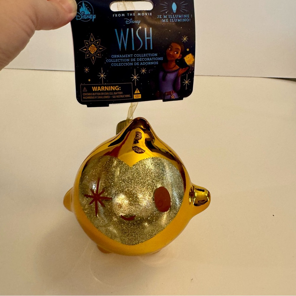 NWT. Disney Wish Star sketchbook glass ornament. 
Sculpted glass ornament